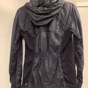 Lululemon Black Zip Up. Rain repellent. Size 6.